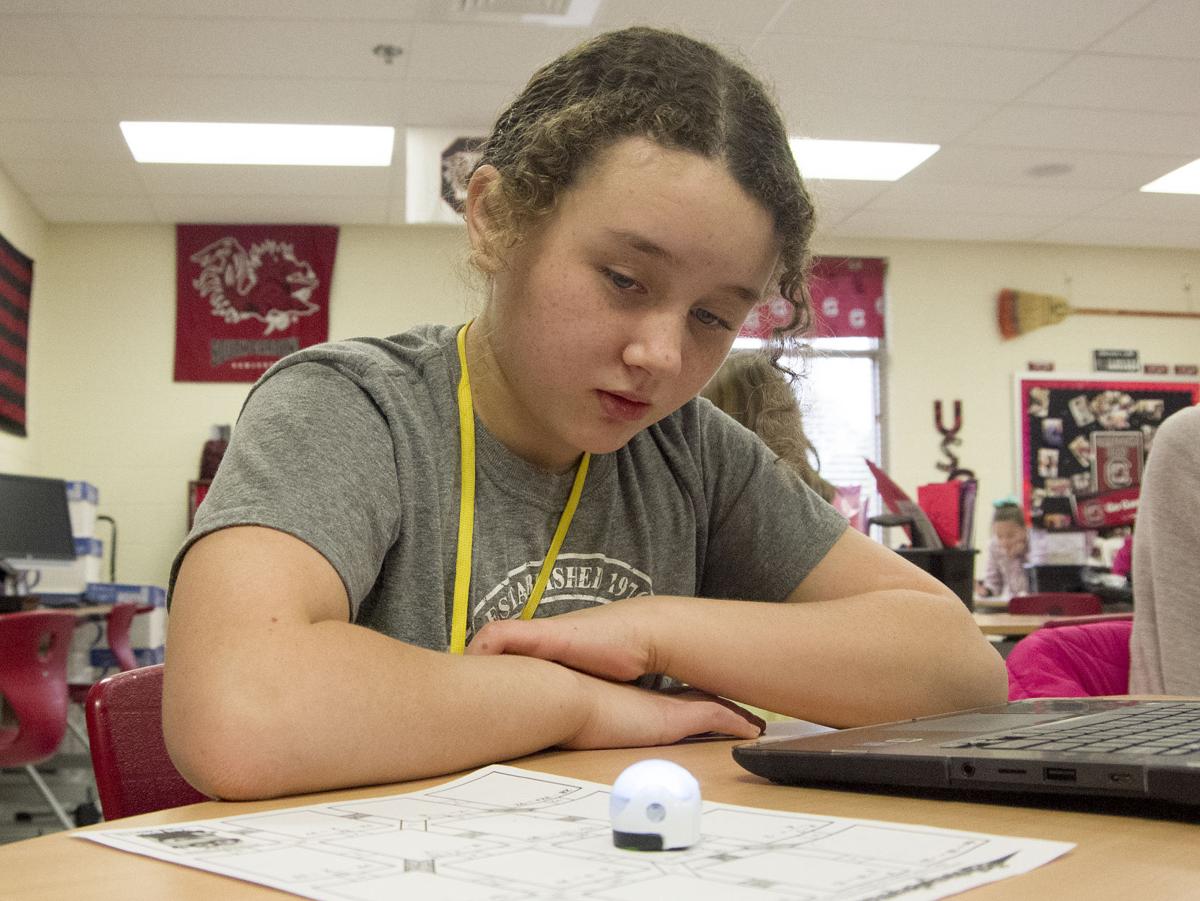 Elementary Students At Florence School Show Off Work With Thumb