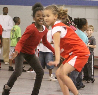 Mullins youth basketball players practice with FMU