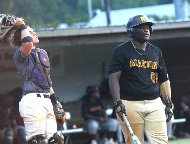 Phillip Simmons holds-off Marion 12-8