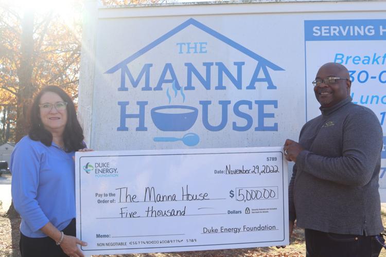 Duke Energy presents 5K donation to Manna House