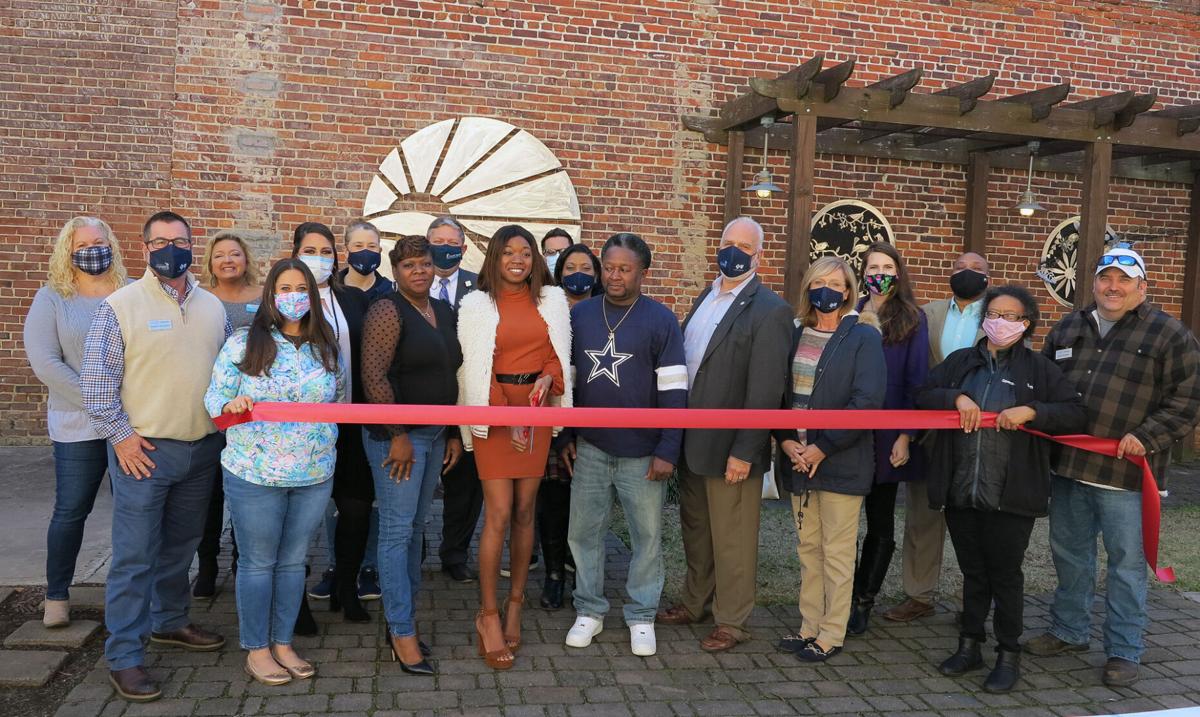 Style Type Clothing Joins The Camera And Celebrates With A Ribbon Cut