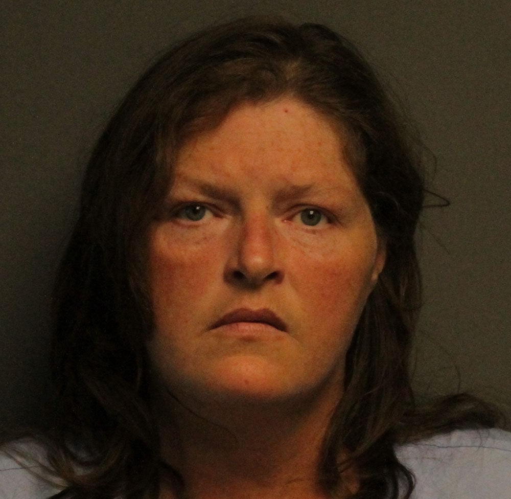 Mullins man shot to death, one person in custody