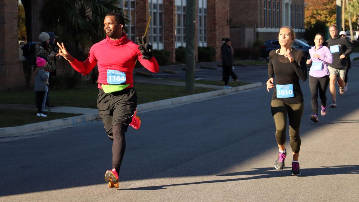 Runners brave the cold to ‘Run Like a Nut’