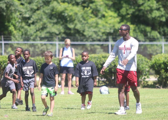 More than 347 children attend Gamecocks football’s Xavier Legette camp in Mullins