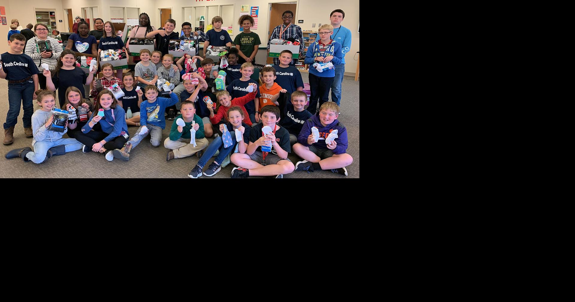 HannahPamplico students blow away their Socktober goal