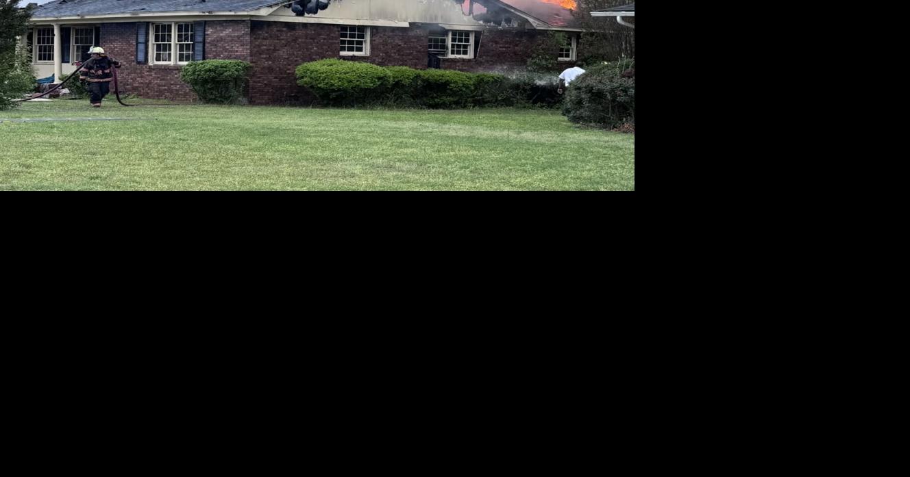 Crews battle house fire in Florence