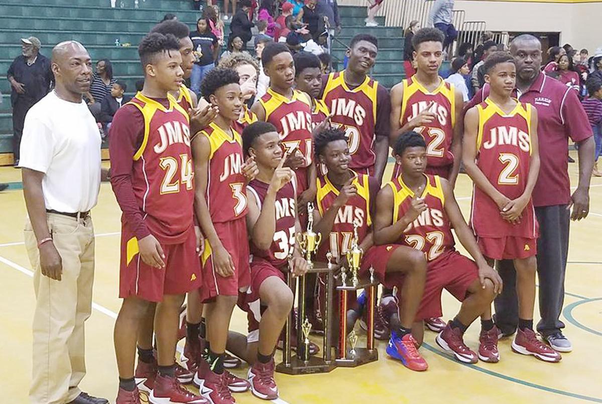 Johnakin girls, boys sweep middle school basketball conference