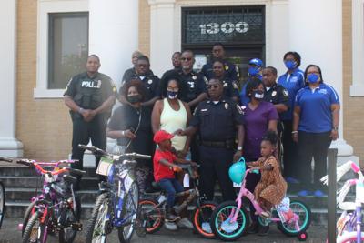 Selma Police and Zeta Phi Beta give out bikes