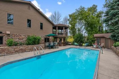 Loads of amenities inside & out, multi-tiered decks & beautifully landscaped.