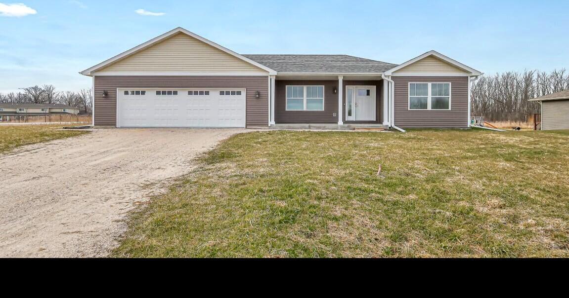 See this Sheboygan home with vaulted ceiling, open concept and 2.5 car