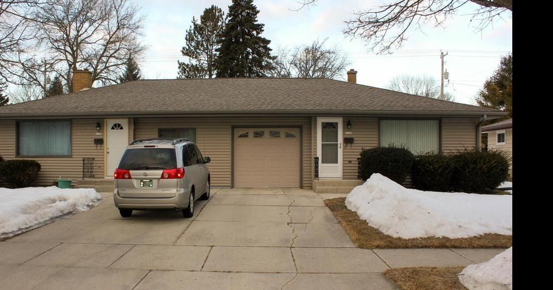 This sidebyside duplex in Sheboygan has hardwood floors, a full bath