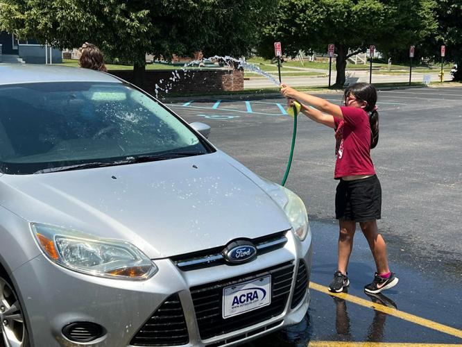 RAISING MONEY AT THE CAR WASH News