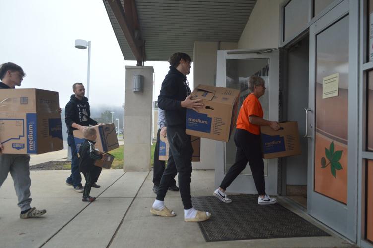 Helper Wesley Kyle's Kicks makes donation in memory of lost family member. | Photo ...