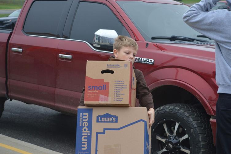 Helper Wesley Kyle's Kicks makes donation in memory of lost family member. | Photo ...