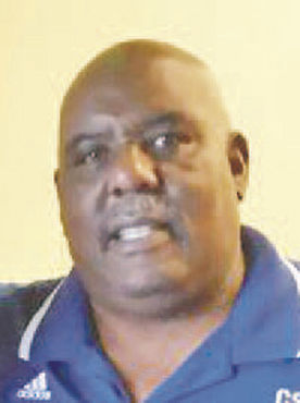 CSM football coach Larry Owens