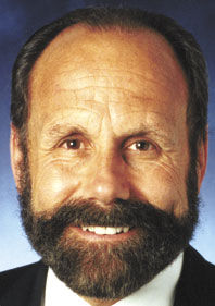 Senator’s mug shot ‘extortion’ bill advances