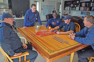 Building a legacy: Redwood City firefighters repurpose bowling lanes into unique tables