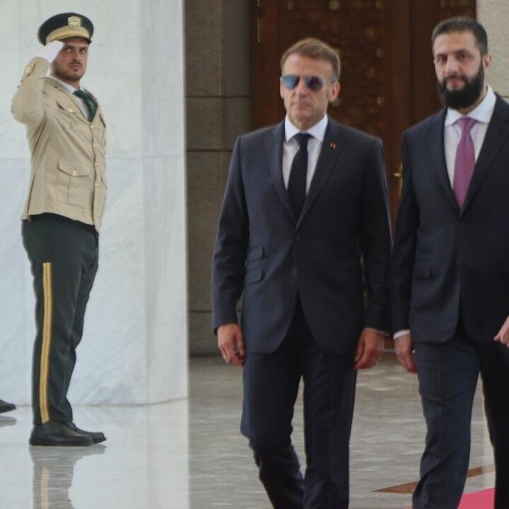 Explosions rock Damascus as Macron visits Syria