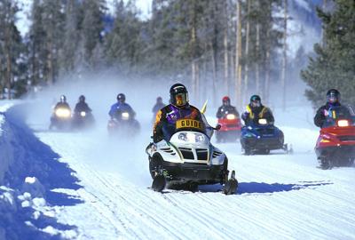Touring Yellowstone by snowmobile