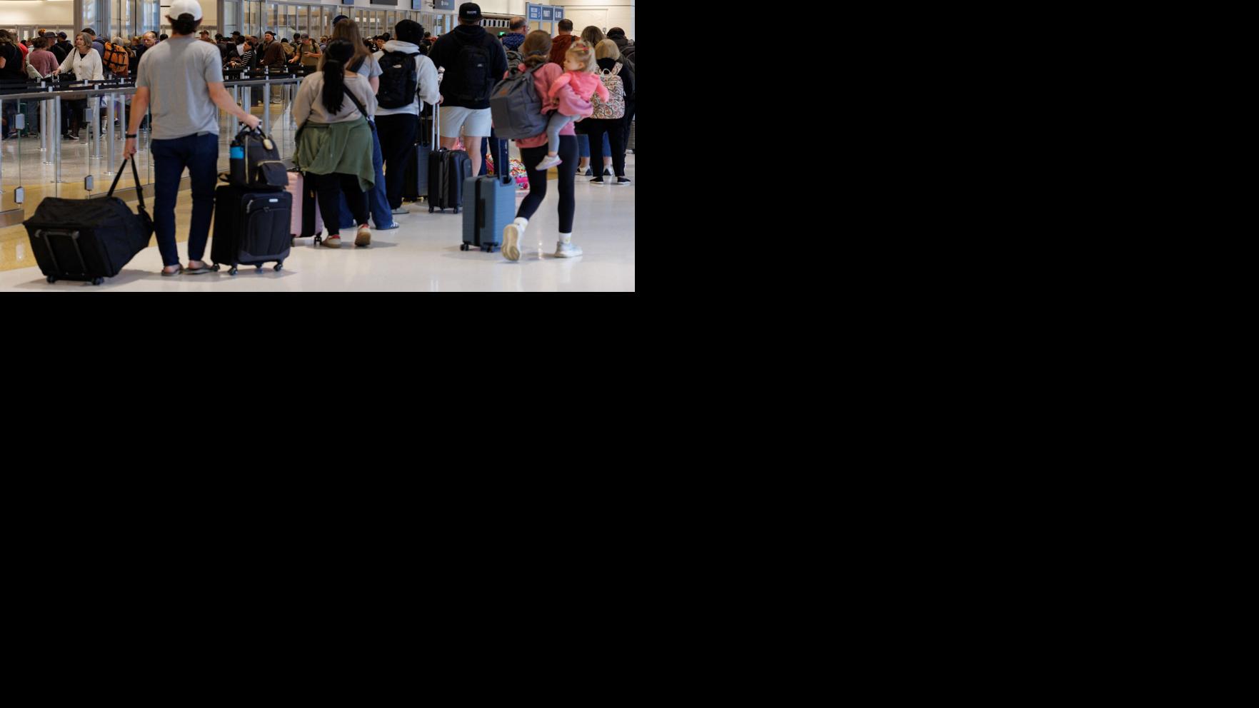 US travelers scramble to adjust as airlines cut flights because of shutdown