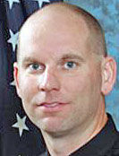 Police: Slain officer was seeking stolen laptop