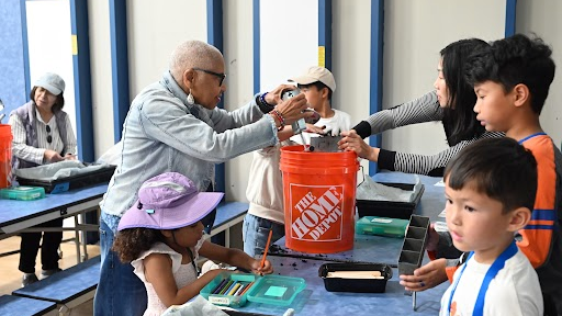 Class Notes: San Bruno residents gather for climate resilience event at Belle Air Elementary School