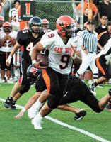 From the sports archives: It's Naufahu's time for San Mateo football