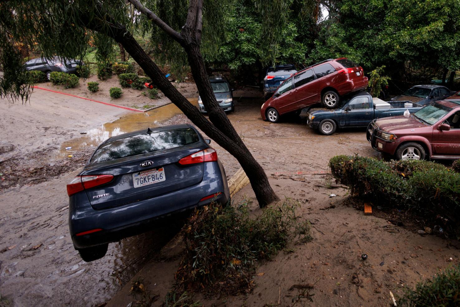 San Diegans cry, hug, outside damaged homes after stunning flash floods