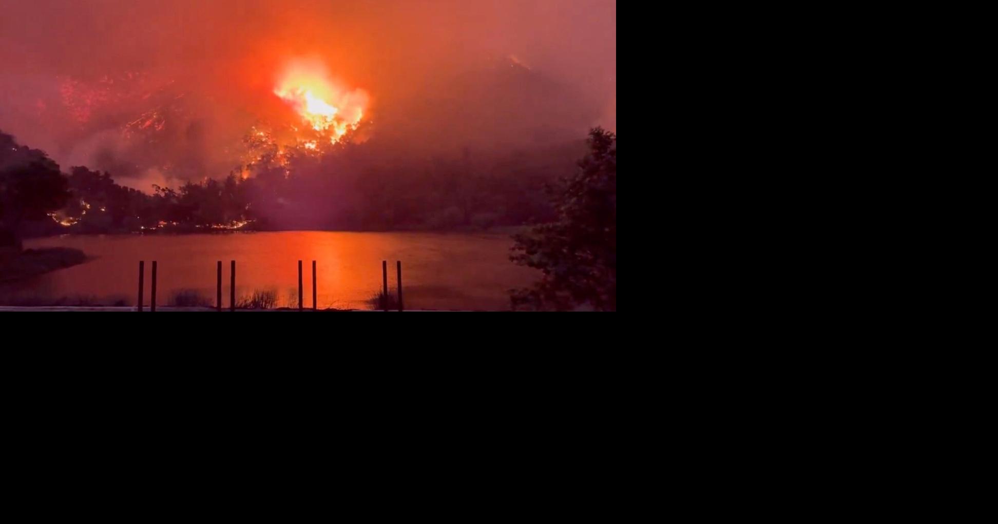 Wildfires plague the West amid a scorching heat wave. Homes burn in ...
