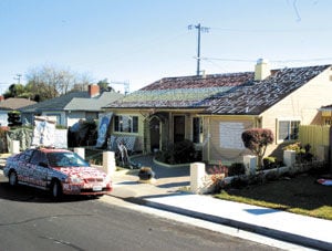 Woman battles city over painted house