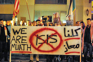 Jordanians hold vigil: Mourners in South San Francisco honor pilot Muath Al-Kasaesbeh killed by Islamic State