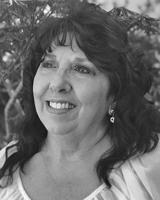Debra "Debbie" Gomez
