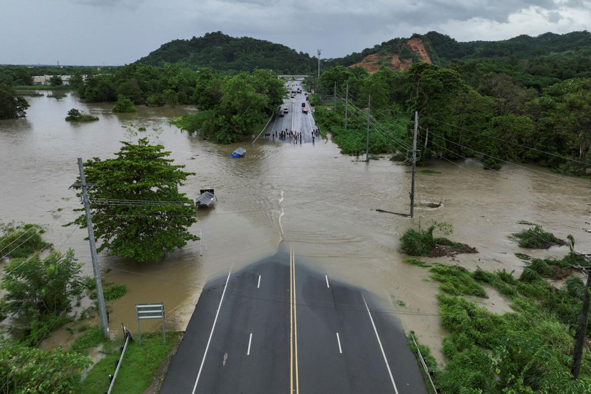 Ernesto becomes a hurricane after pummeling northeast Caribbean and knocking out power in the region | World | smdailyjournal.com