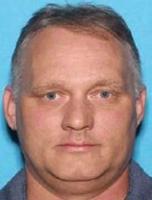 Synagogue suspect pleads not guilty as funerals continue