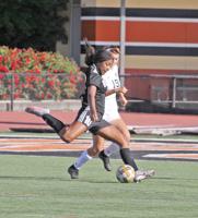 Woodside girls' soccer team overwhelms Burlingame