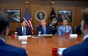 Trump hails a 'unique' Cabinet meeting at Camp David as he seizes on Spain's migration crisis
