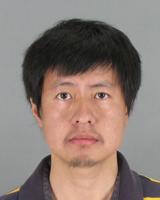 Man accused of killing dog behind bars