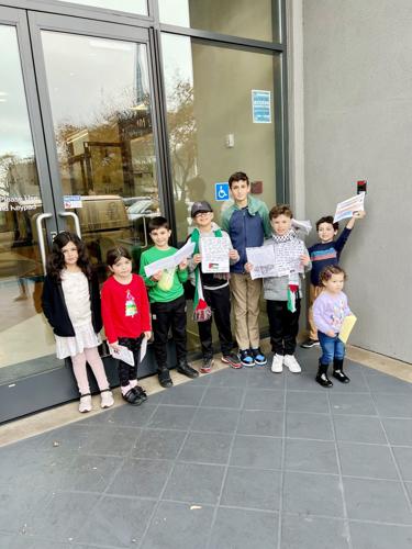 Local children call for a ceasefire in Gaza