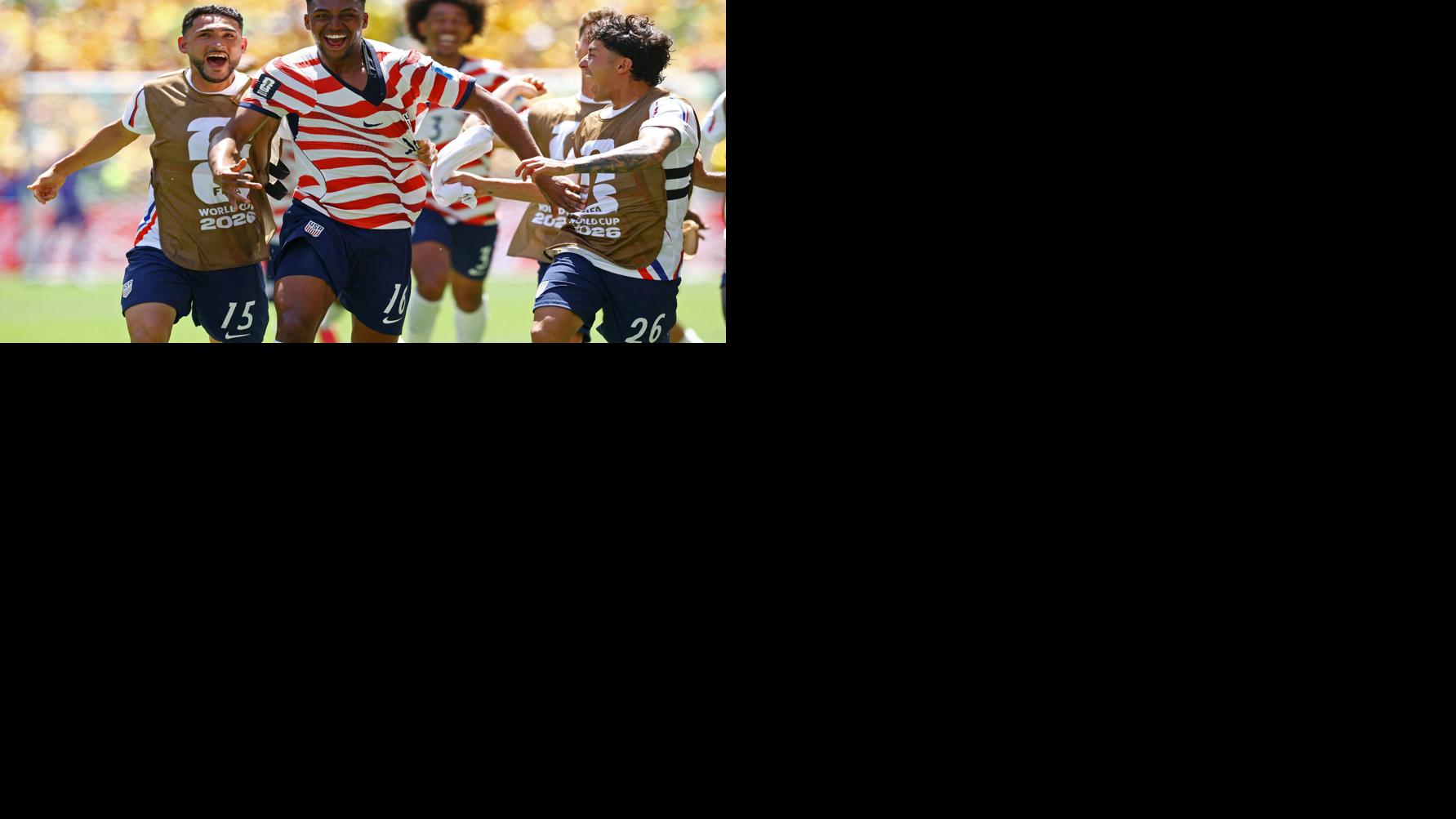 US reaches World Cup knockout round and wins its group with 2nd straight victory, 2-0 over Australia
