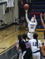 Carlmont girls' basketball team scoops up varsity coaching win for Moss