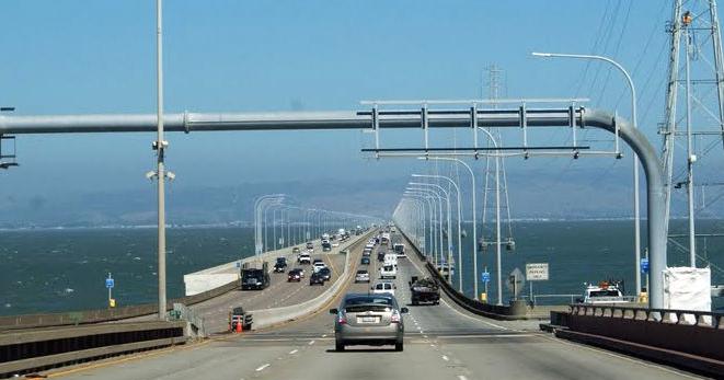Overturned vehicle blocks lanes on San Mateo Bridge | Local News ...