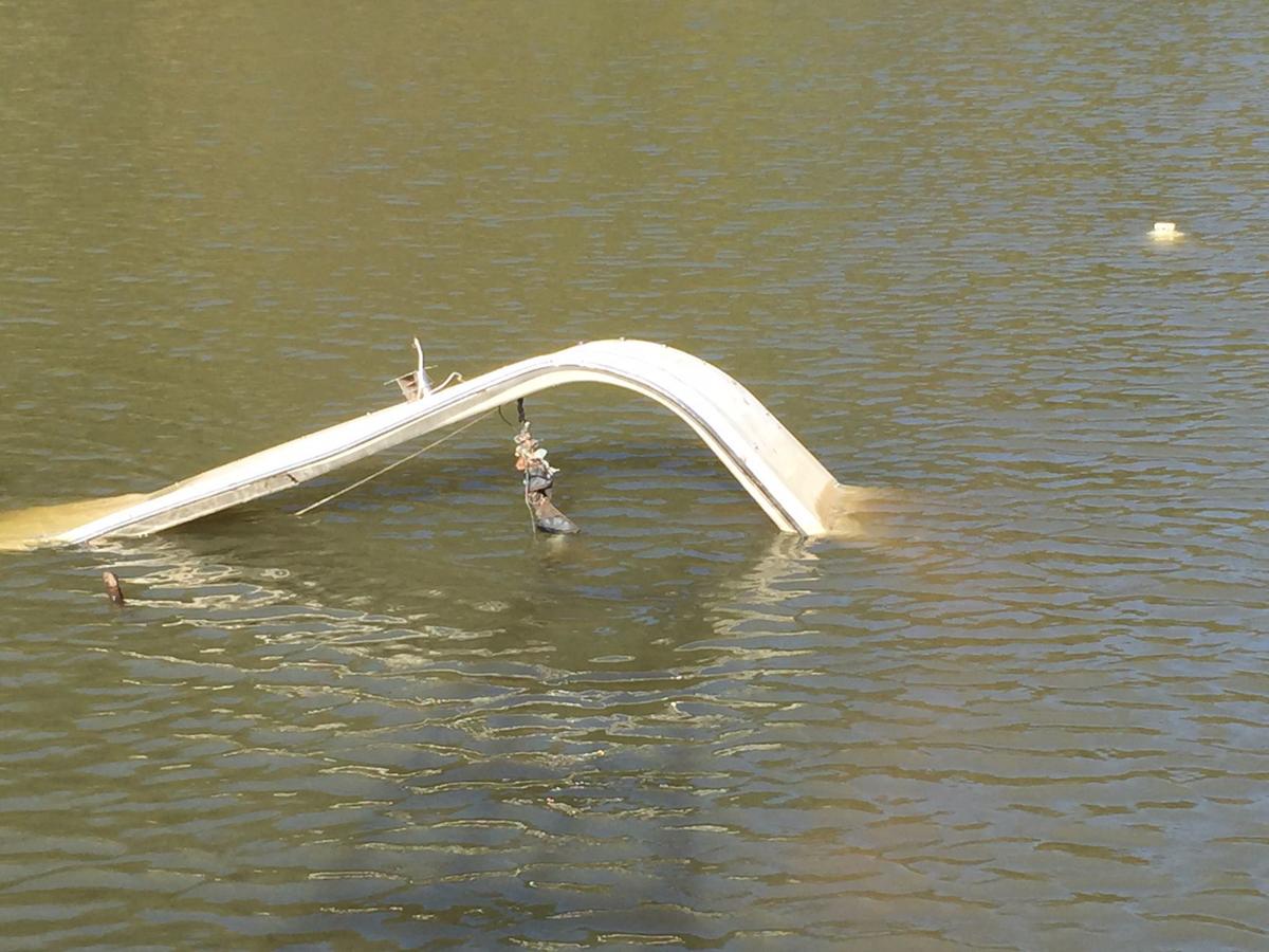 Sunken houseboat at channel marker R85