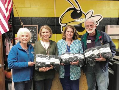 Moneta Lions donate socks to students