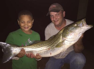 Young Moneta resident catches his first striper