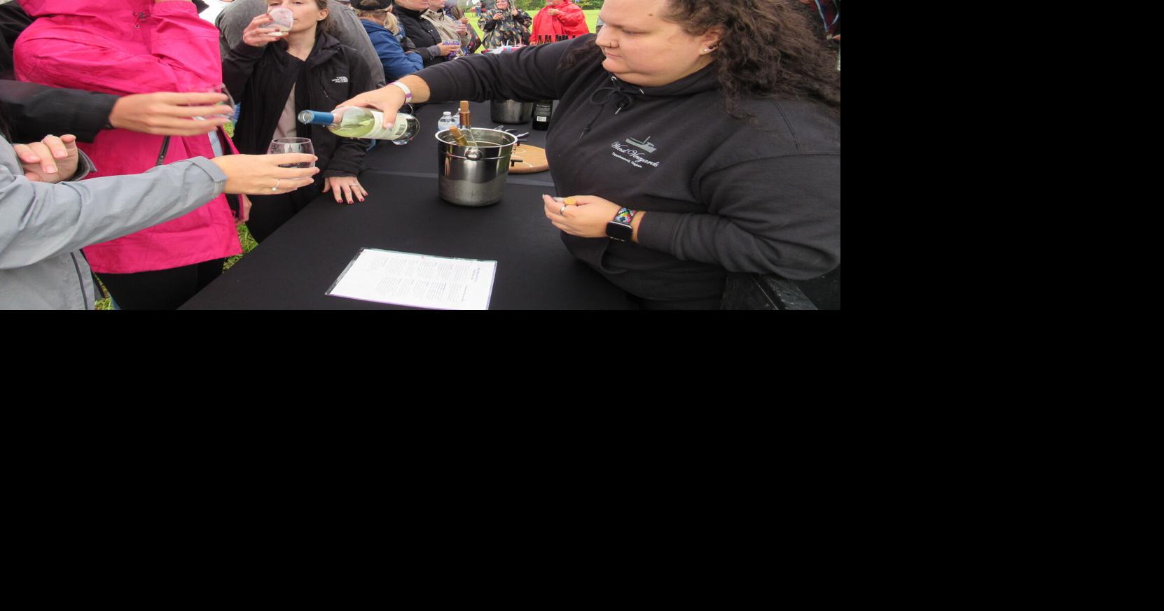 Rain doesn't stop tasters at the SML Wine Festival