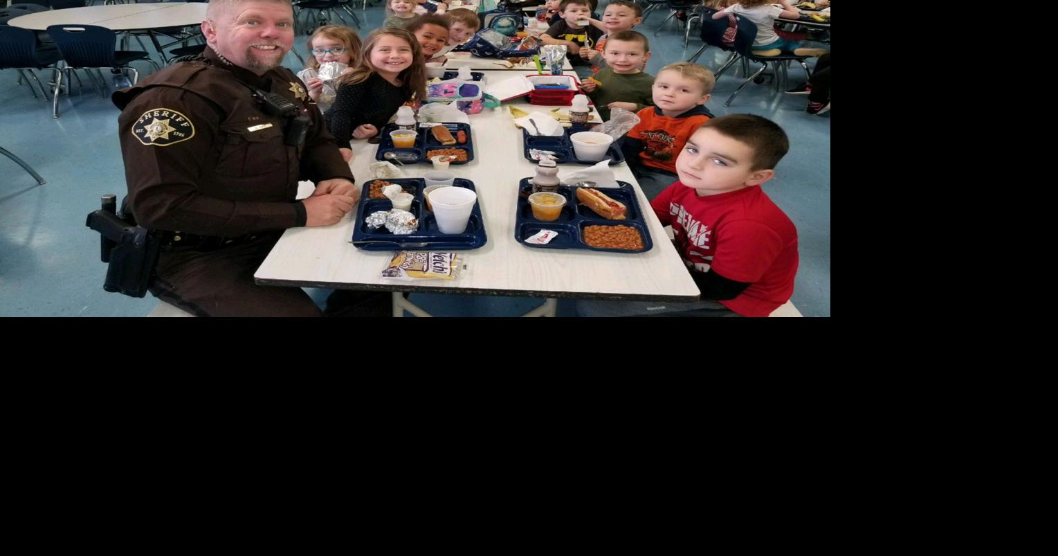 Officers visit with Burnt Chimney students