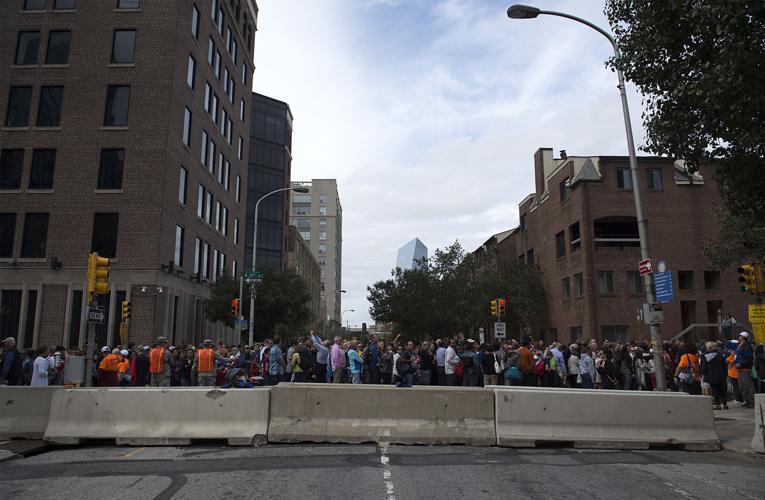 Massive lines leave people in limbo while waiting to see Pope Francis