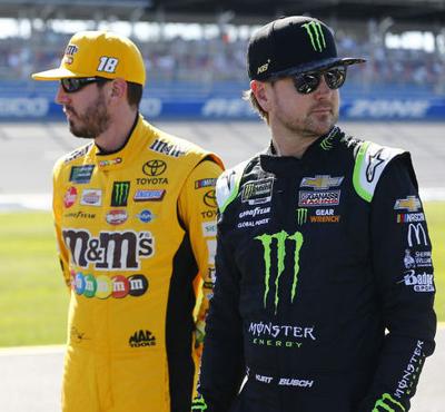 From left: Kyle Busch (18) and Kurt Busch (1) before  qualifying for the GEICO 500 at Talladega Superspeedway in Talladega, Alabama.