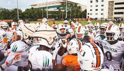 Canes scrimmage under the lights on Greentree.
