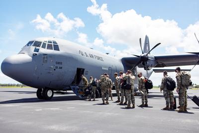 Haiti command and control element boards a C-130 aircraft from Homestead Air Reserve base to direct disaster relief operation in Haiti, Aug. 17.